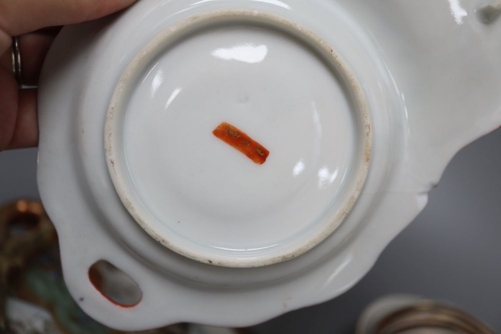 A Chinese yellow ground bowl, a figure, spoon rests etc.